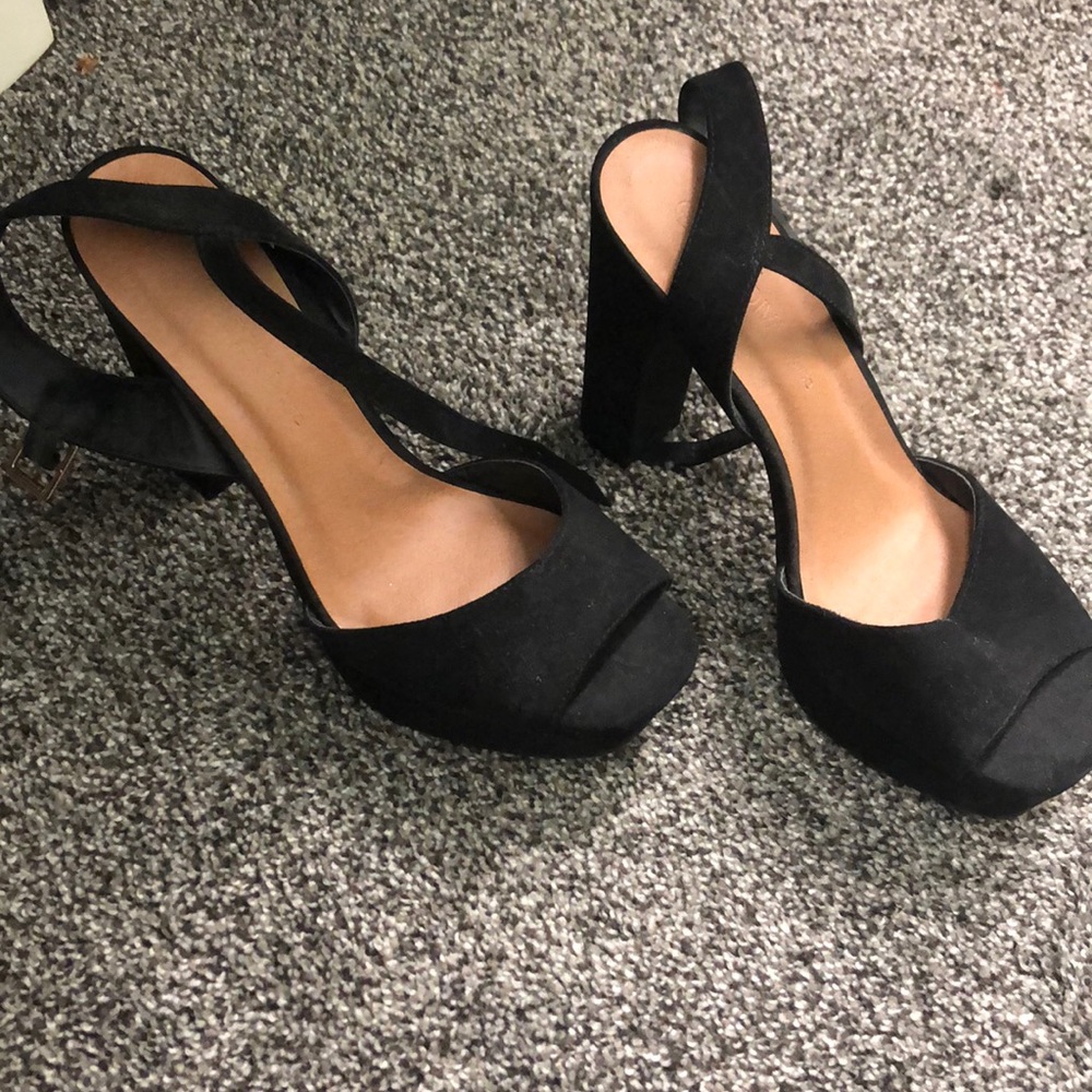 Black Heels, NEVER WORN brand New. heel size is about 5 inches, Size 8.5